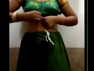 VID-20140201-PV0001-Sivakasi (IT) Tamil 20 yrs old continent beautiful, hot and sexy comprehensive Ms. Nandhini S. B.Sc., Chemistry, 2nd yr undressing her saree in her home after attending a bond fun